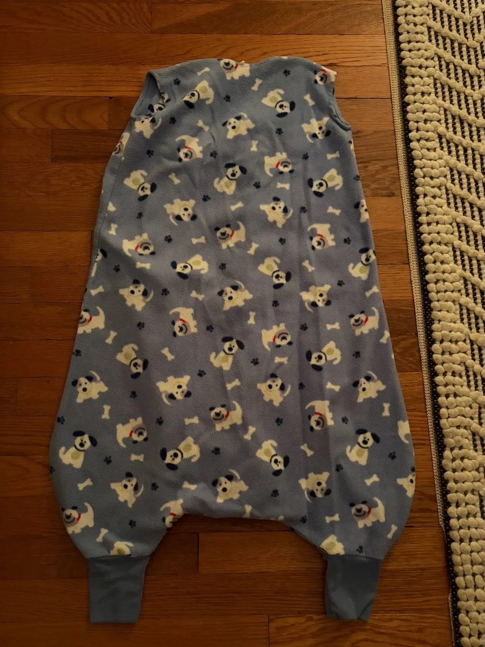 HALO Early Walker SleepSack in a blue puppy/dog fleece pattern